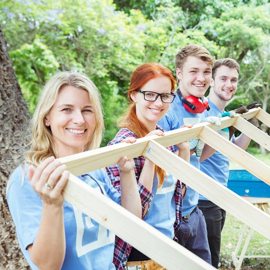 Volunteers building a house