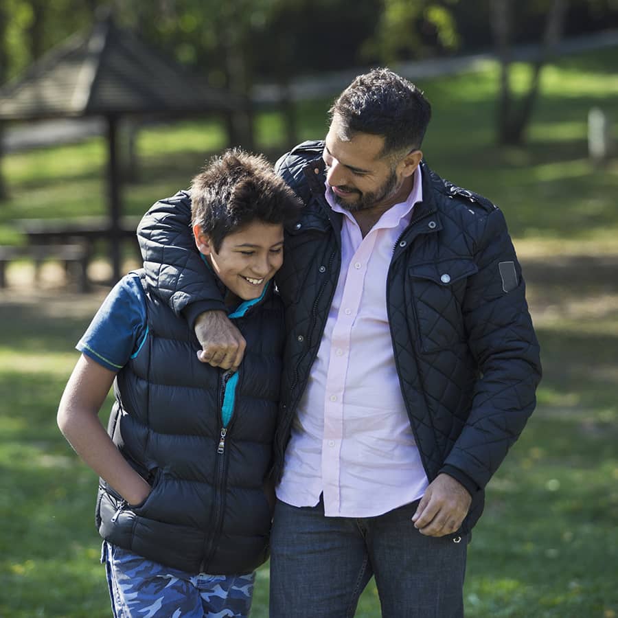 A man and his son in the park