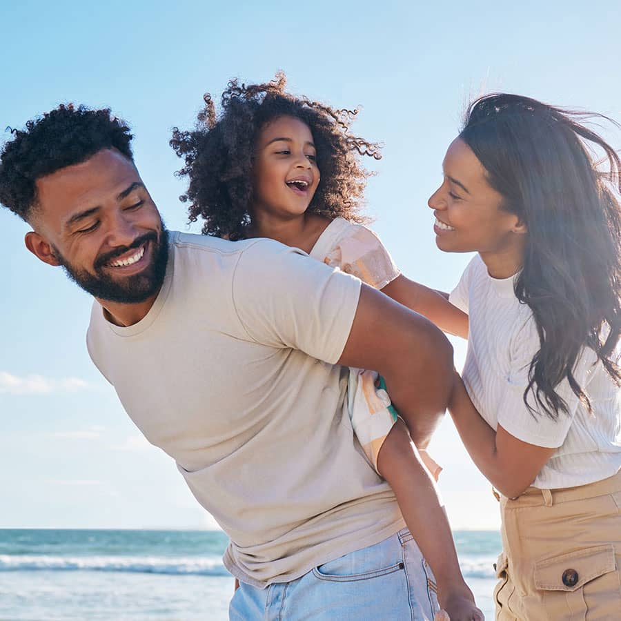 A family playing at the beach