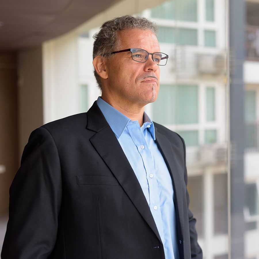 A businessman gazing out a window